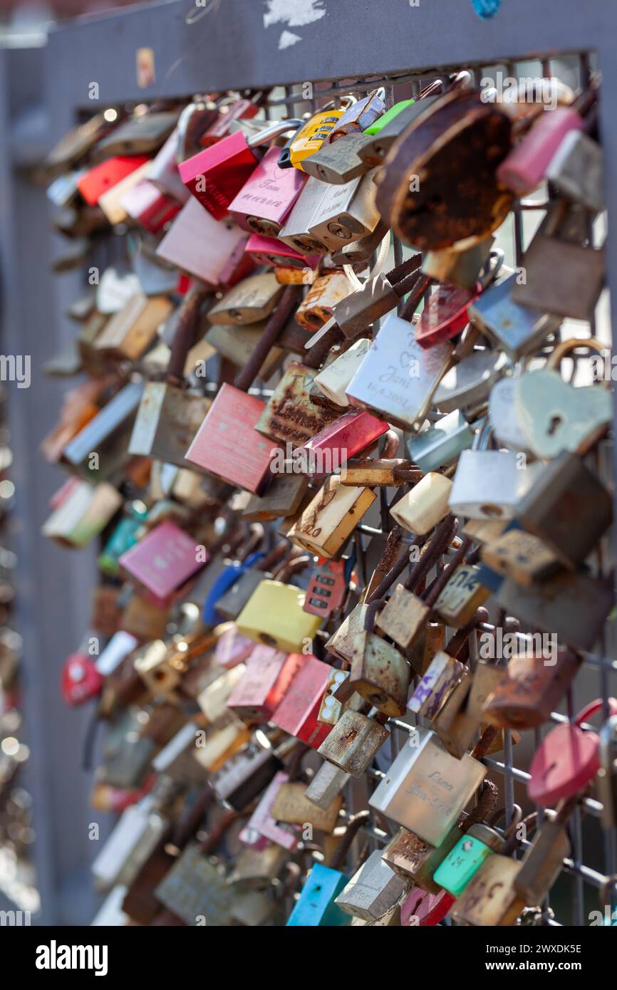 Love lock bridge at Katajanokka with many locks. Couples putting locks