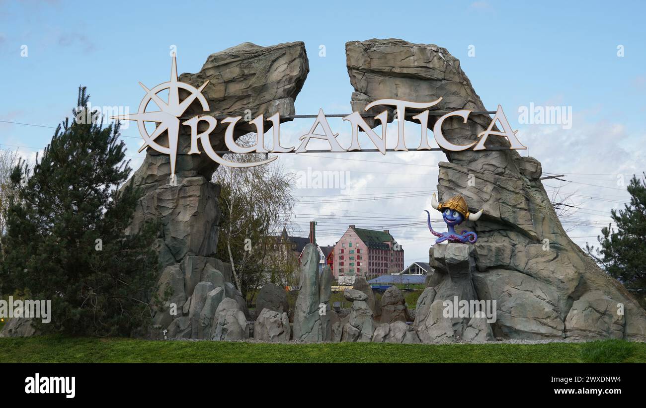 Rust, Germany-March 28.2024: Logo and lettering of "Rulantica", the large water world of the "Europa-Park", with the mascot "Snorri", on a rock format Stock Photo