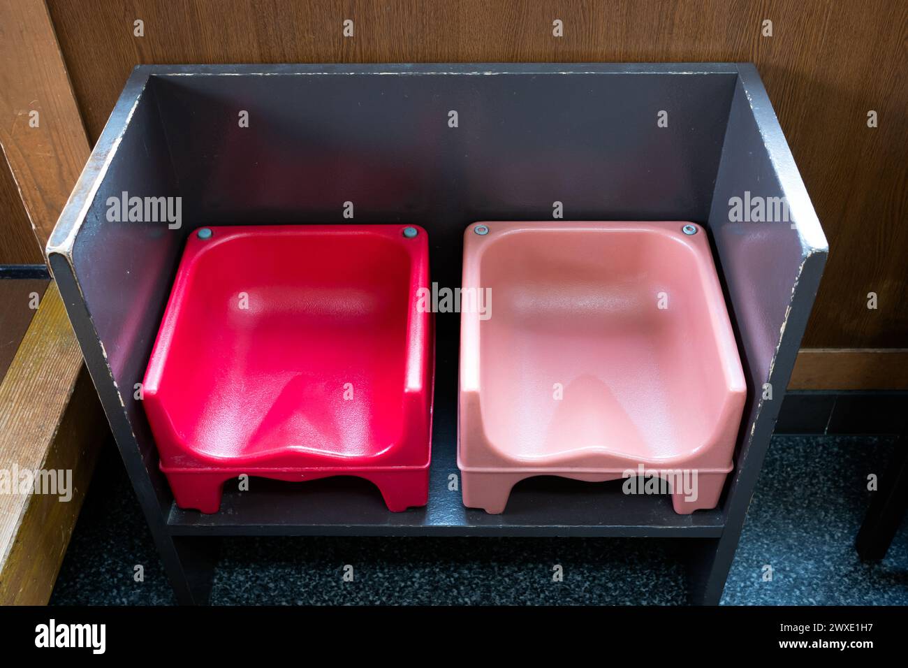 Child seats in a restaurant for toddlers and small kids. Stock Photo