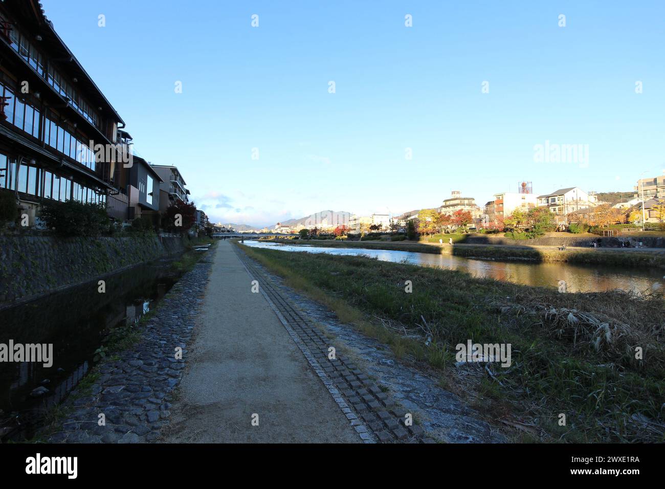 Autumn scenery along Kamogawa River in Kyoto, Japan Stock Photo