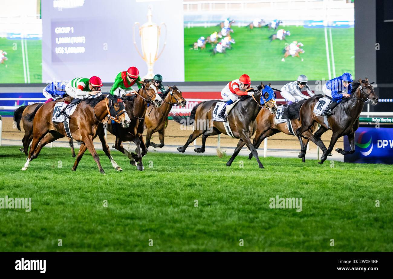 Meydan Racecourse, United Arab Emirates. Saturday 30th March 2024. Facteur Cheval and jockey Maxime Guyon win the 2024 renewal of the Group 1 Dubai Turf sponsored by DP World for trainer Jerome Reynier and owner Team Valor LLC & Gary Barber. Credit JTW Equine Images / Alamy. Stock Photo