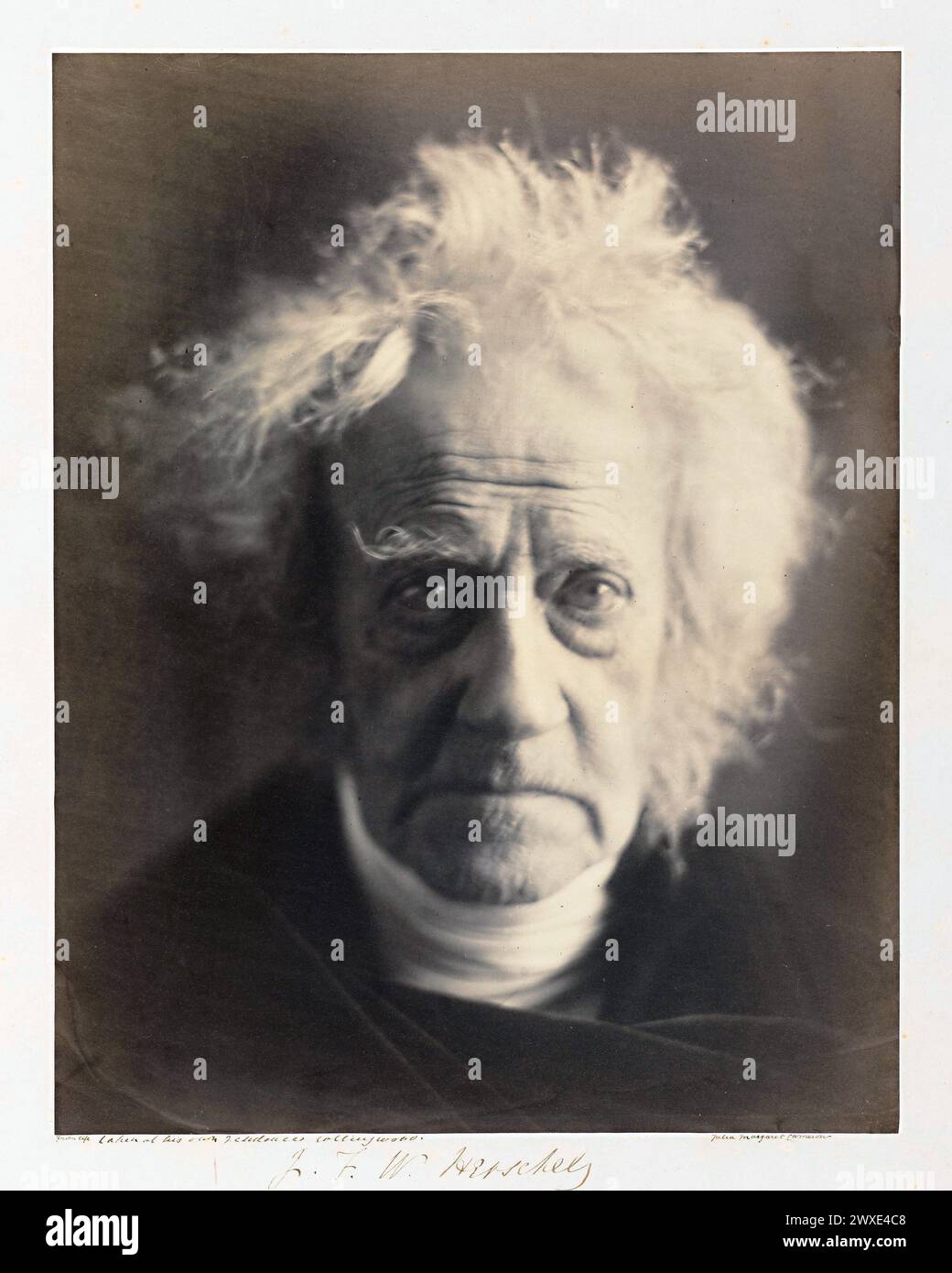 Portrait of the astronomer Sir John Herschel, photographed by Julia Margaret Cameron, 1867. Albumen print  Sir John Frederick William Herschel, 1st Baronet KH FRS was an English polymath active as a mathematician, astronomer, chemist, inventor, and experimental photographer who invented the blueprint and did botanical work. Herschel originated the use of the Julian day system in astronomy Stock Photo