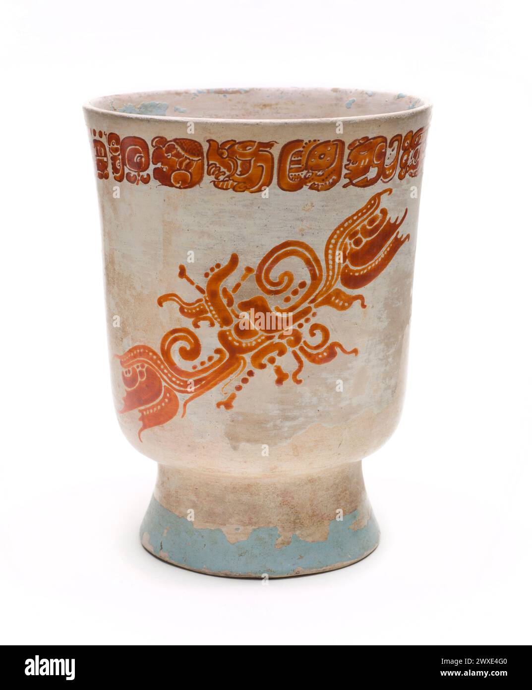 Polychrome Cylinder Vessel with Pedestal Base Guatemala or Mexico, Northern Peten or Southern Campeche, possibly Los Alacranes, Maya, 650-800 CE. Slip-painted ceramic with post-fire stucco and pigment. 16.8cm high. Stock Photo