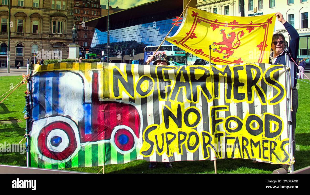 Glasgow, Scotland, UK. 30th March, 2024:   Farmers protest banner against who and its policies  in george square in front of the local government seat of city chambers this afternoon .  Credit Gerard Ferry /Alamy Live News Stock Photo
