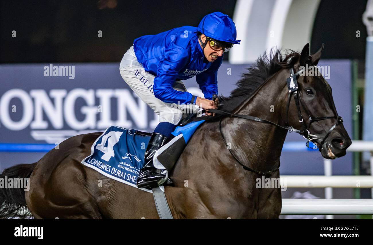 Meydan Racecourse, United Arab Emirates. Saturday 30th March 2024. Rebel's Romance and jockey William Buick win the 2024 renewal of the Group 1 Longines Dubai Sheema Classic for trainer Charlie Appleby and owner Godolphin. Credit JTW Equine Images / Alamy. Stock Photo