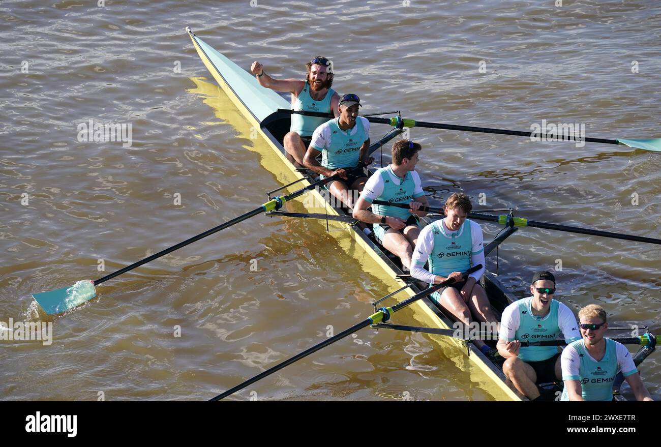 The Cambridge team's Sebastian Benzecry, Noam Mouelle, Thomas Marsh, Augustus John, Kenneth Coplan and Thomas Lynch celebrate winning the 169th Men's Gemini Boat Race 2024 on the River Thames, London. Picture date: Saturday March 30, 2024. Stock Photo
