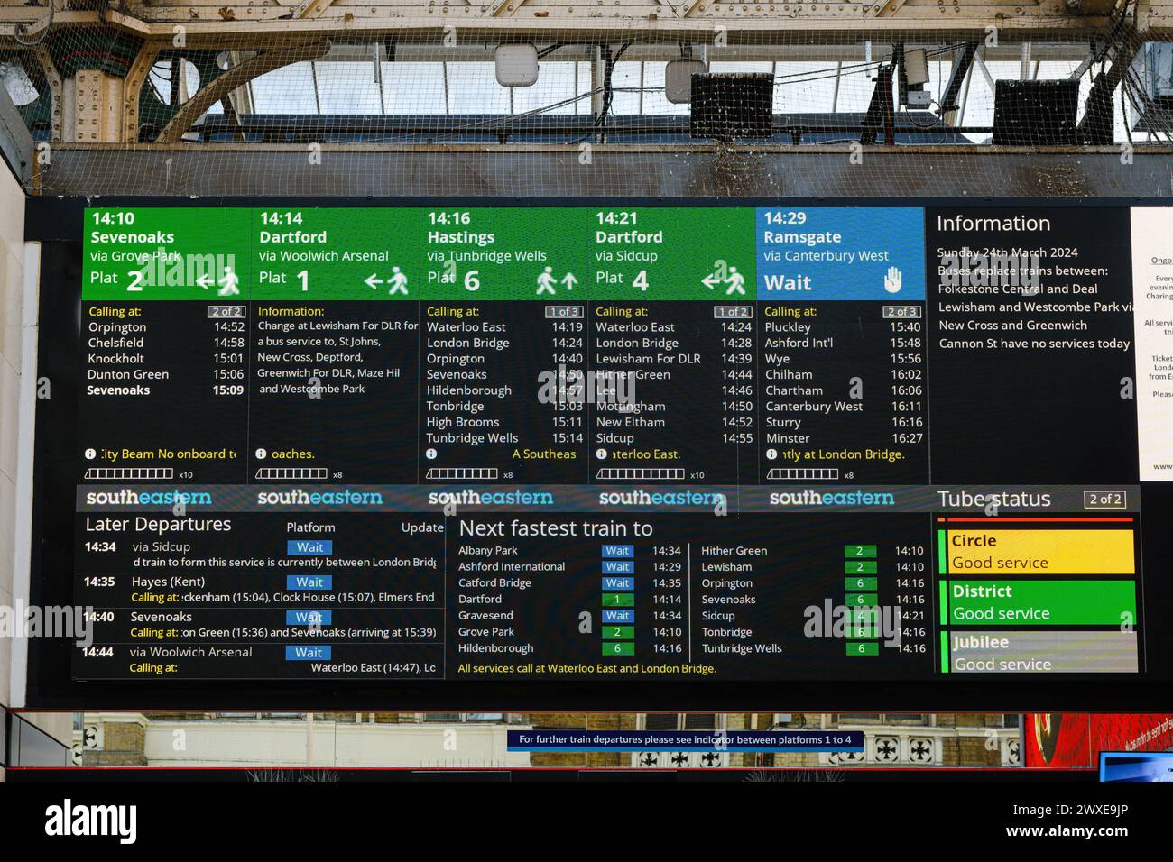 London, UK - March 24, 2024; Electronic train departure board at Charing Cross Station in London Stock Photo