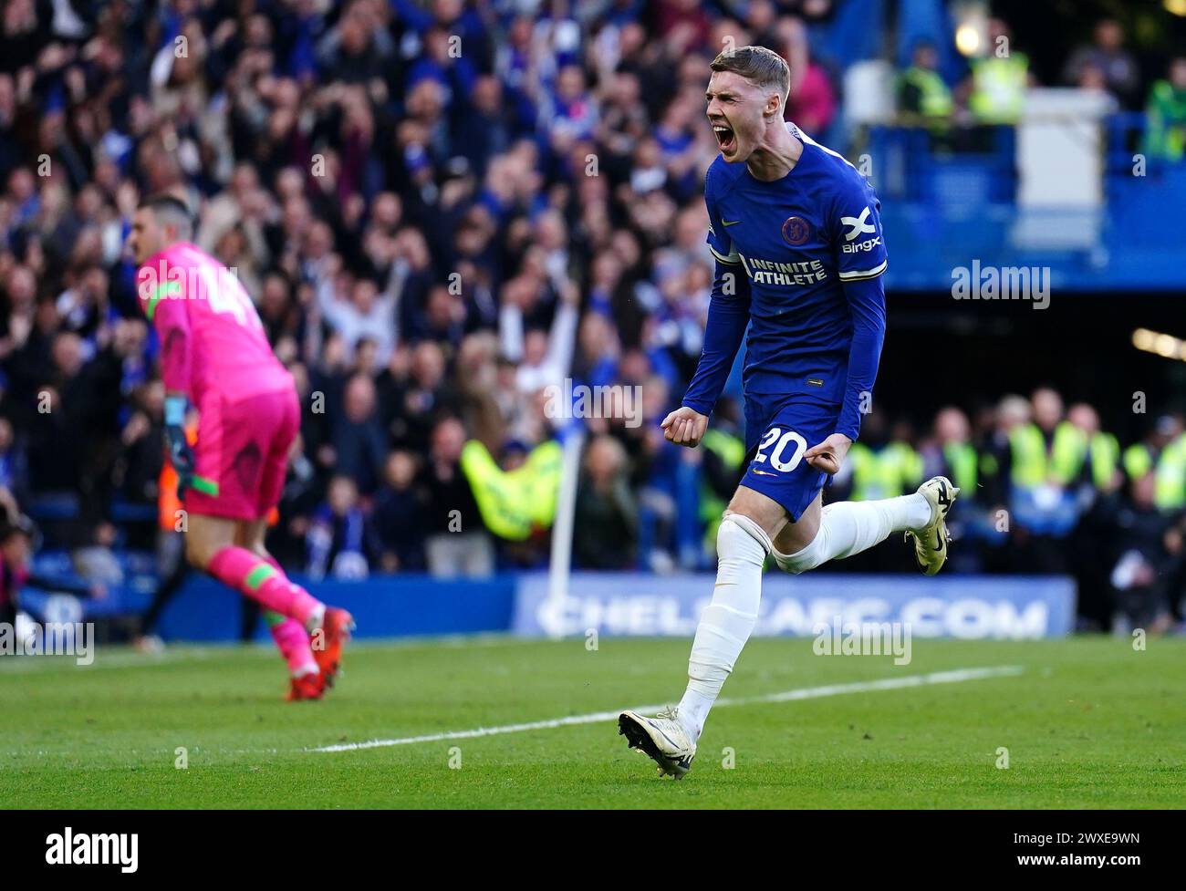 Chelsea's Cole Palmer celebrates scoring their side's second goal of the game during the Premier League match at Stamford Bridge, London. Picture date: Saturday March 30, 2024. Stock Photo