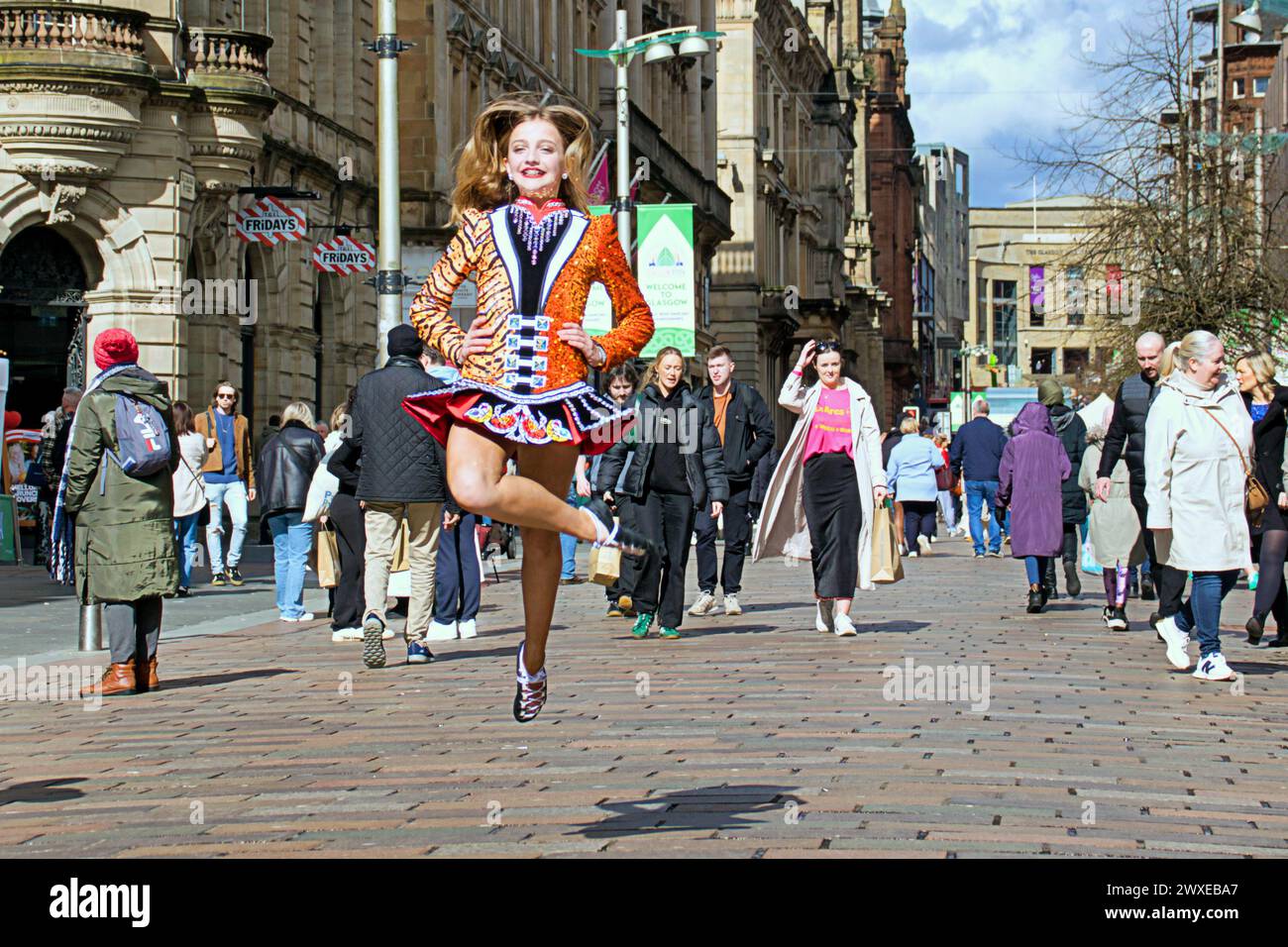 Glasgow, Scotland, UK. 30th March, 2024:   The World Irish Dancing Championships came to the style mile and shopping capital of Scotland Buchanan street this afternoon as dancers showed their moves to local shoppers in the sunshine  .  Credit Gerard Ferry /Alamy Live News Stock Photo