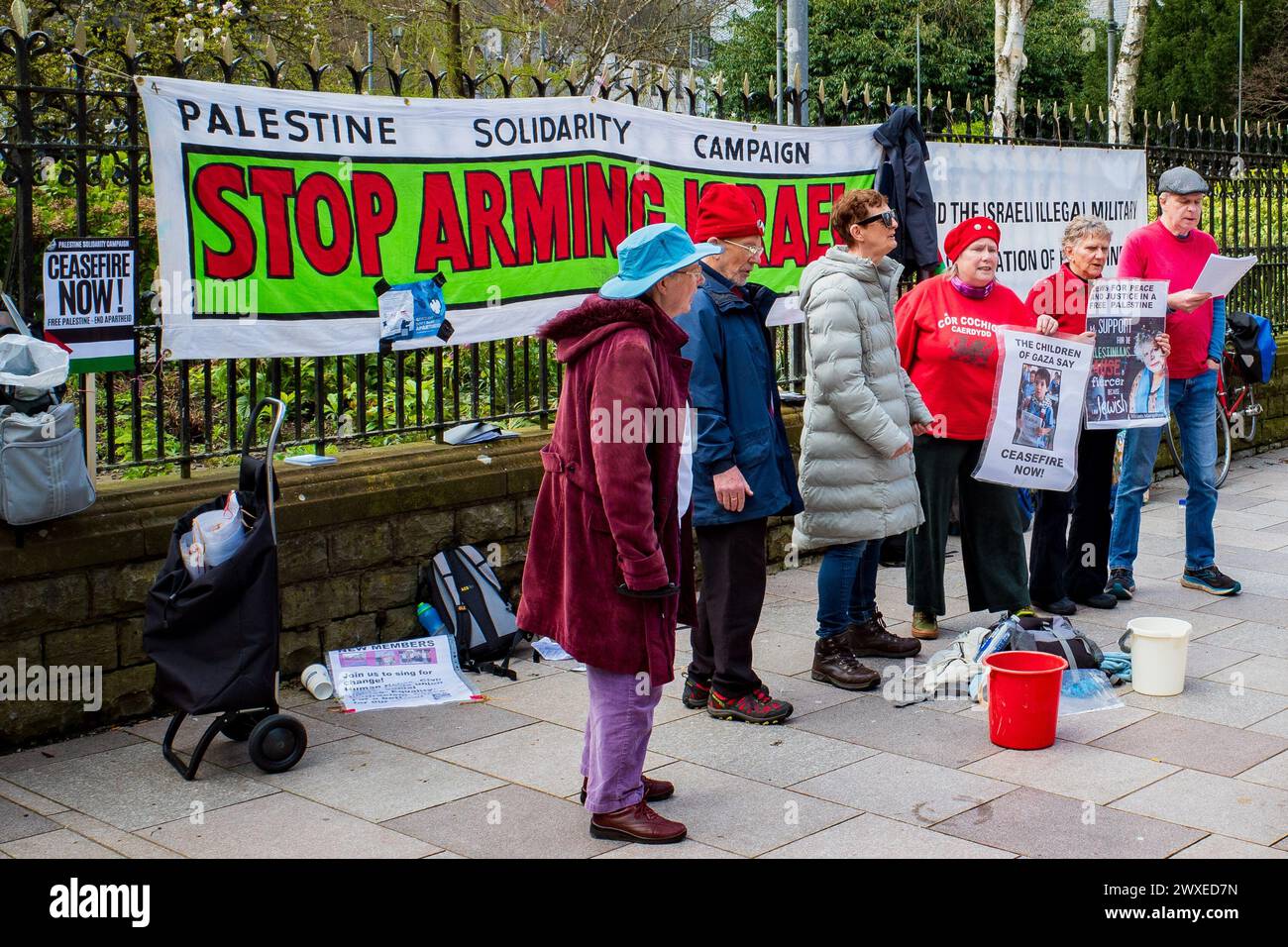 Participants in a peace street demonstration - Palestine Solidarity Campaign. Cardiff City Centre. Easter.  Stop arming Israel. Stock Photo