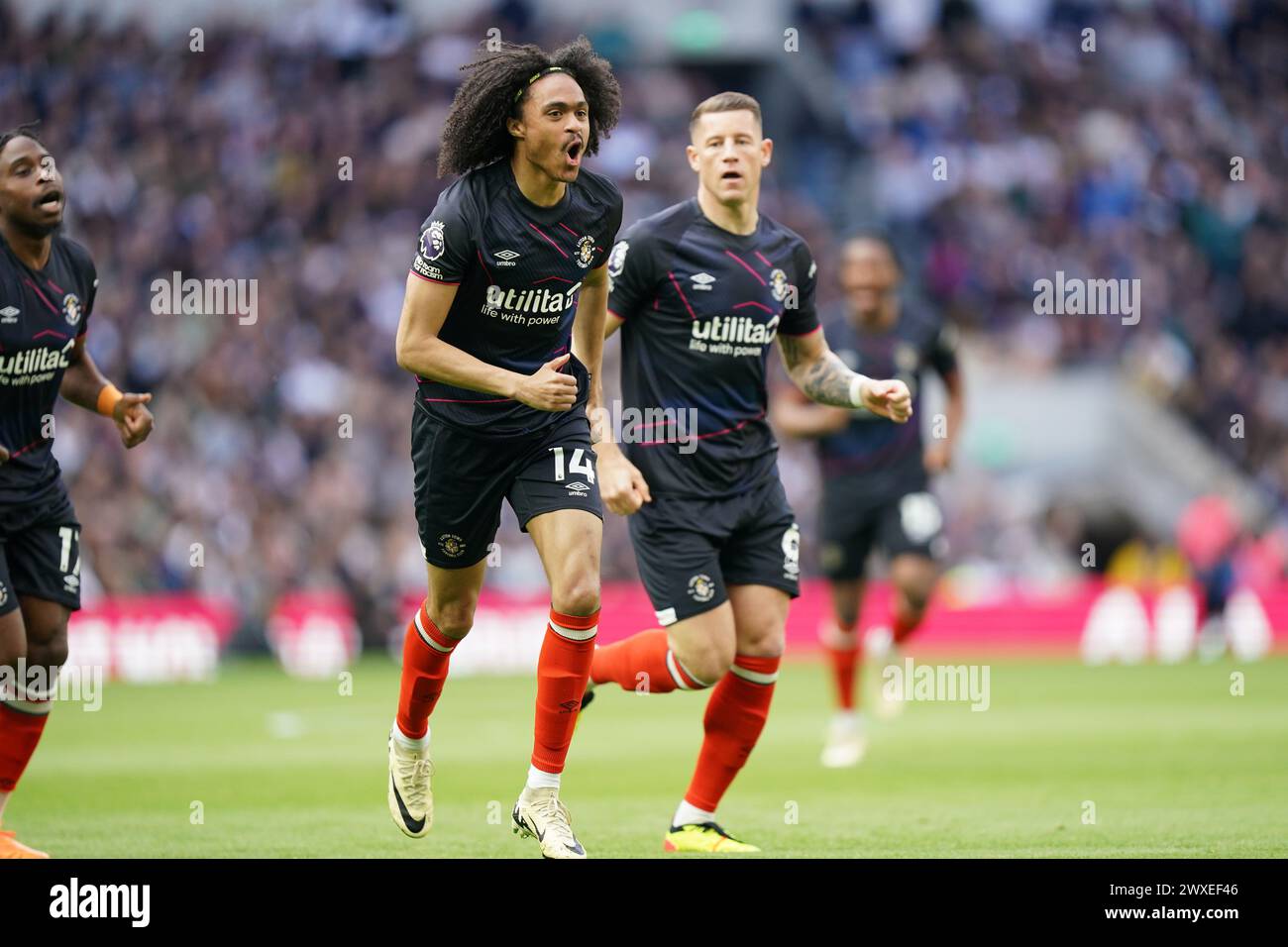 LONDON, ENGLAND - MARCH 30: Tahith Chong of Luton Town celebrating his goal to make it 0-1 during the Premier League match between Tottenham Hotspur and Luton Town at Tottenham Hotspur Stadium on March 30, 2024 in London, England.(Photo by Dylan Hepworth/MB Media) Stock Photo