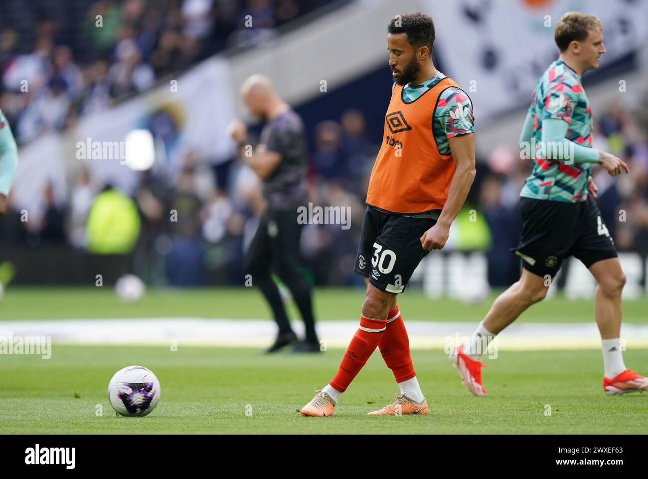 LONDON, ENGLAND - MARCH 30: Cauley Woodrow of Luton Town warming up before the Premier League match between Tottenham Hotspur and Luton Town at Tottenham Hotspur Stadium on March 30, 2024 in London, England.(Photo by Dylan Hepworth/MB Media) Stock Photo