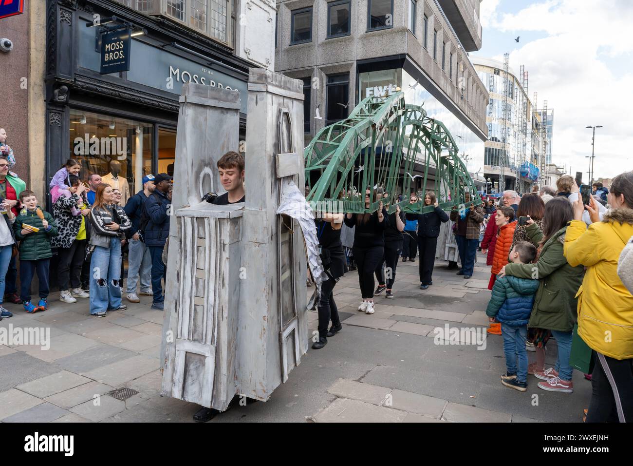Newcastle upon Tyne, UK. 30th March 2024. Beasts on the Street, puppet performances on Northumberland Street in the city, as Newcastle Puppetry Festival is launched. The festival runs until 7th April. -- Pictured: The Tyne Bridge - part of the City of Kittiwakes Parade. Credit: Hazel Plater/Alamy Live News Stock Photo