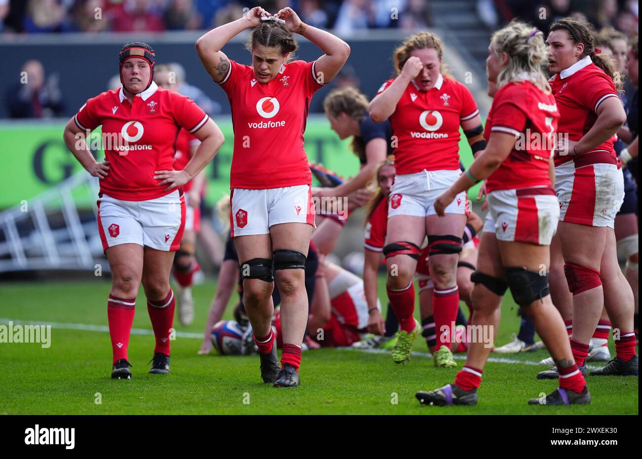 Wales' Natalia John (centre) looking dejected after England score their seventh try during the Guinness Women's Six Nations match at Ashton Gate, Bristol. Picture date: Saturday March 30, 2024. Stock Photo
