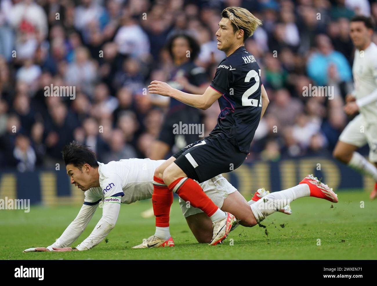 LONDON, ENGLAND - MARCH 30: Daiki Hashioka of Luton Town and Son Heung-Min of Tottenham Hotspur during the Premier League match between Tottenham Hotspur and Luton Town at Tottenham Hotspur Stadium on March 30, 2024 in London, England.(Photo by Dylan Hepworth/MB Media) Stock Photo