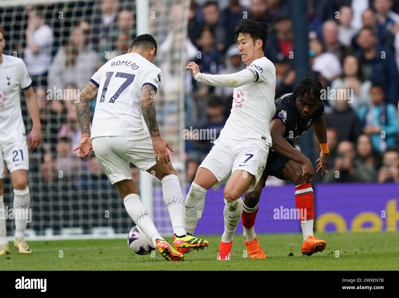 LONDON, ENGLAND - MARCH 30: Son Heung-Min of Tottenham Hotspur and Pelly Ruddock Mpanzu of Luton Town battling for the ball during the Premier League match between Tottenham Hotspur and Luton Town at Tottenham Hotspur Stadium on March 30, 2024 in London, England.(Photo by Dylan Hepworth/MB Media) Stock Photo
