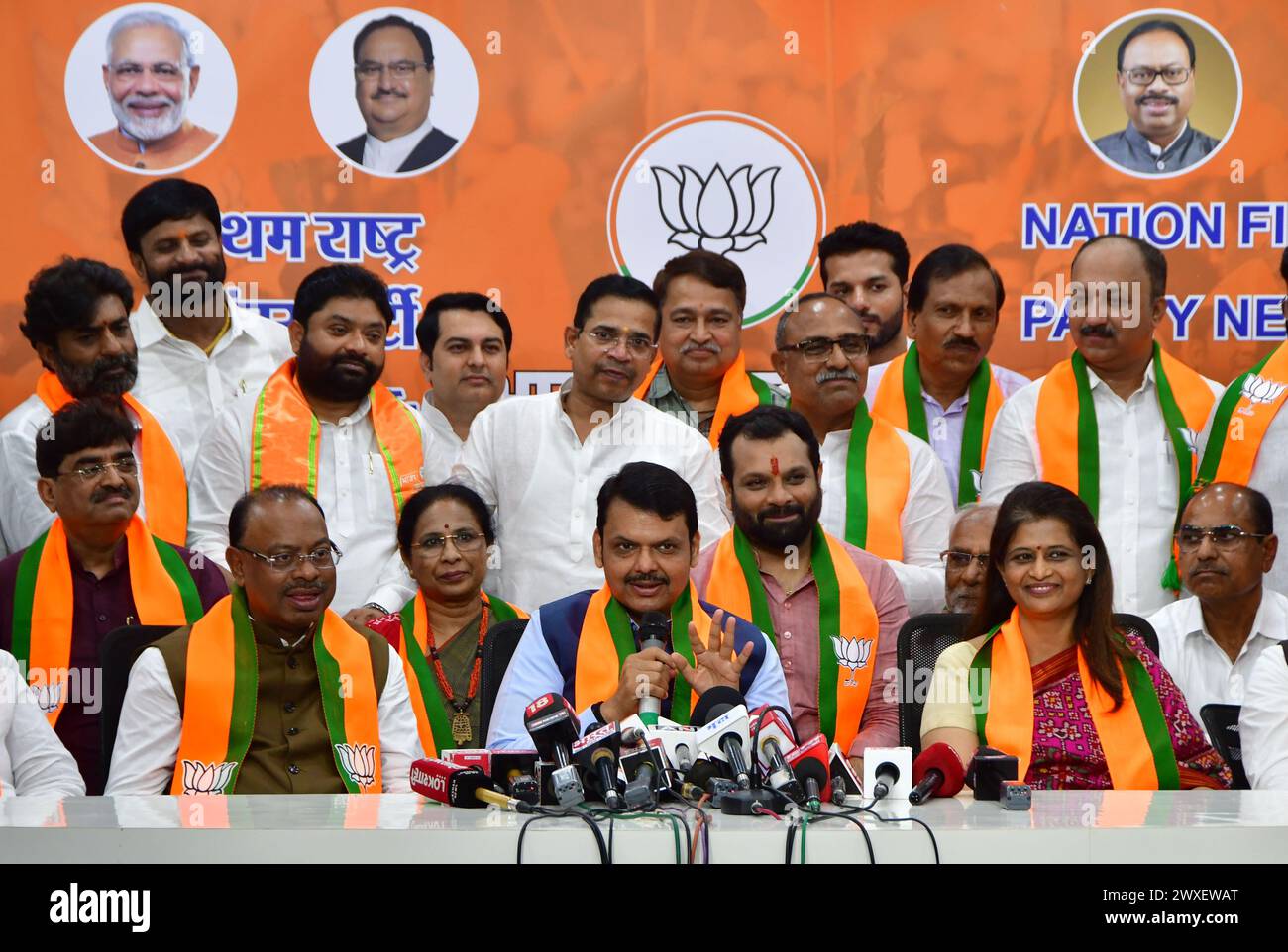 MUMBAI, INDIA - MARCH 30: Former Lok Sabha Speaker Shivraj Patil's daughter Archana Patil Chakurkar joins BJP in the presence of Maharashtra Dy CM Devendra Fadnavis and Maharashtra BJP President Chandrashekar Bawankule, on March 30, 2024 in Mumbai, India. Archana Patil said she has been associated with social work for the last two decades and decided to choose the BJP for politics. Shivraj Patil, who hails from Latur in Marathwada region of Maharashtra, was Union home minister during the UPA-I government, but stepped down in the wake of the 26/11 Mumbai terror attacks. (Photo by Bhushan Koyand Stock Photo
