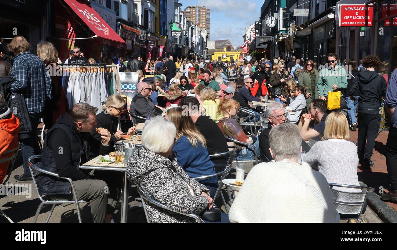 Cafes and crowds in Gardner Street in the North Laines of Brighton Stock Photo