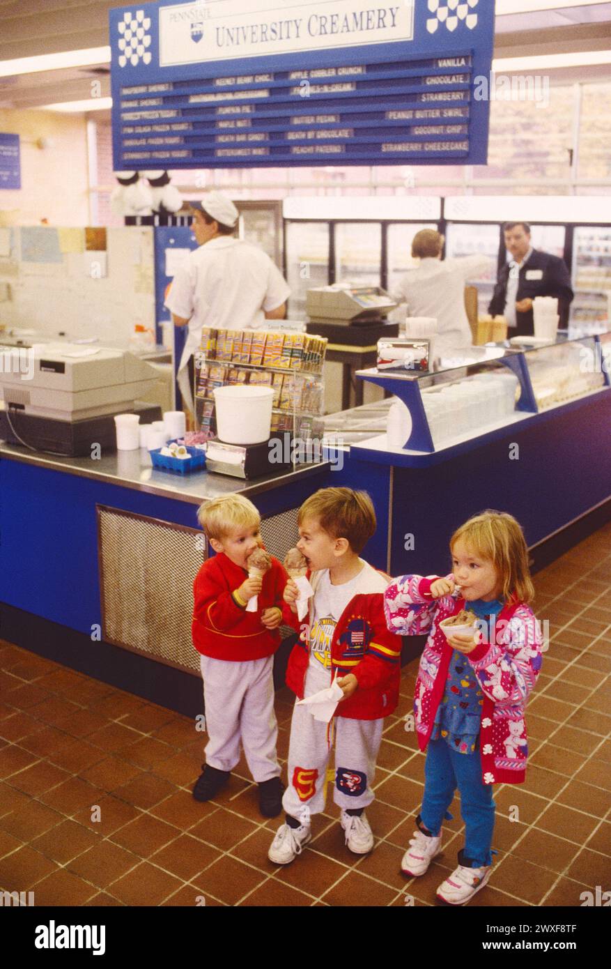 Three small chilldren enjoy fresh ice cream cones at The Creamery
