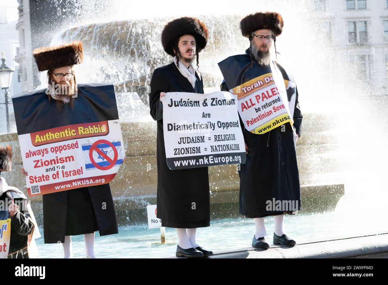 London, UK. 30 March, 2024. Ultra-orthodox Haredi Jews join tens of thousands of Palestine supporters at a rally in Trafalgar Square calling for a ceasefire and an end to UK and US support for Israel's siege, bombardment and invasion of Gaza following an attack by Hamas militants. Organised by a coalition of groups including the Palestine Solidarity Campaign, Stop The War Coalition, Friends of Al Aqsa and CND, the event coincided with Land Day, an annual commemoration by Palestinians of the killing of unarmed protesters, half of them women, opposing Israeli plans to confiscate land in 1976. Cr Stock Photo