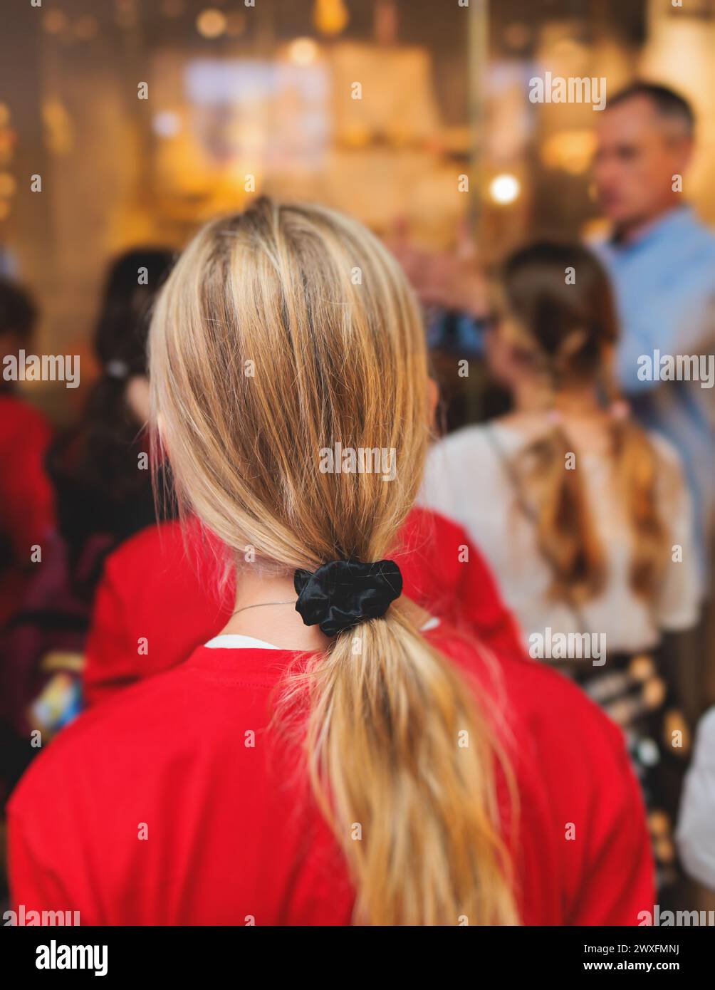 Group of students and school pupils in a science museum exhibition