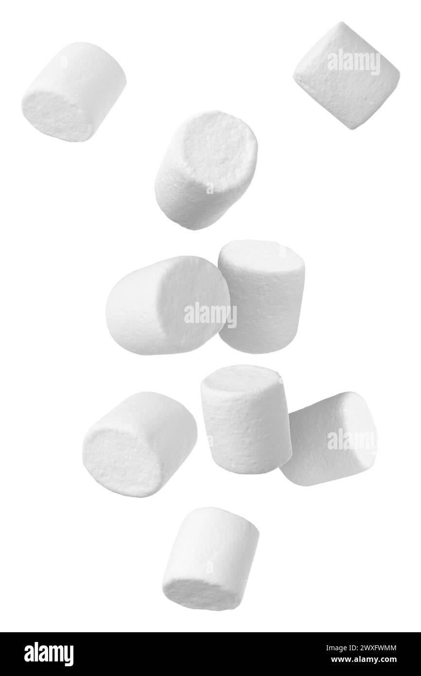 Many yummy marshmallows flying on white background Stock Photo - Alamy