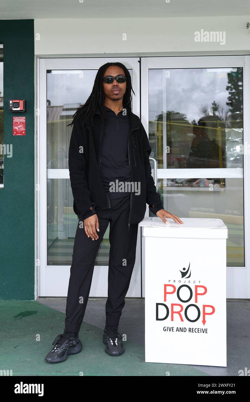 Woodland Hills, California, USA. 30th March, 2024. Digital creator Travis White attending Project Pop Drop's Charity Easter Egg Hunt for Hope the Mission in Woodland Hills, California. Credit: Sheri Determan Stock Photo
