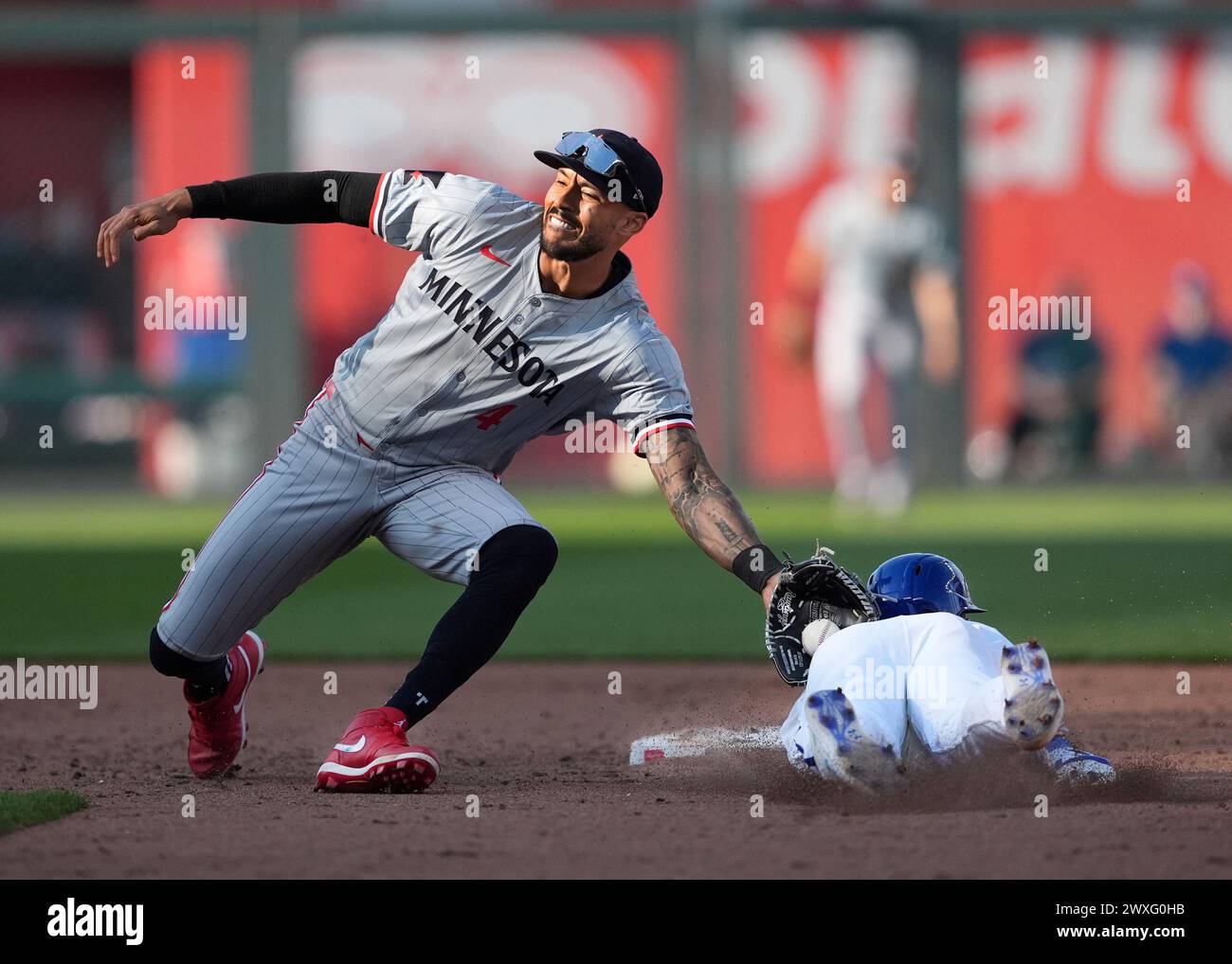 MAR 30, 2024: Minnesota Twins shortstop Carlos Correa (4) makes the tag ...
