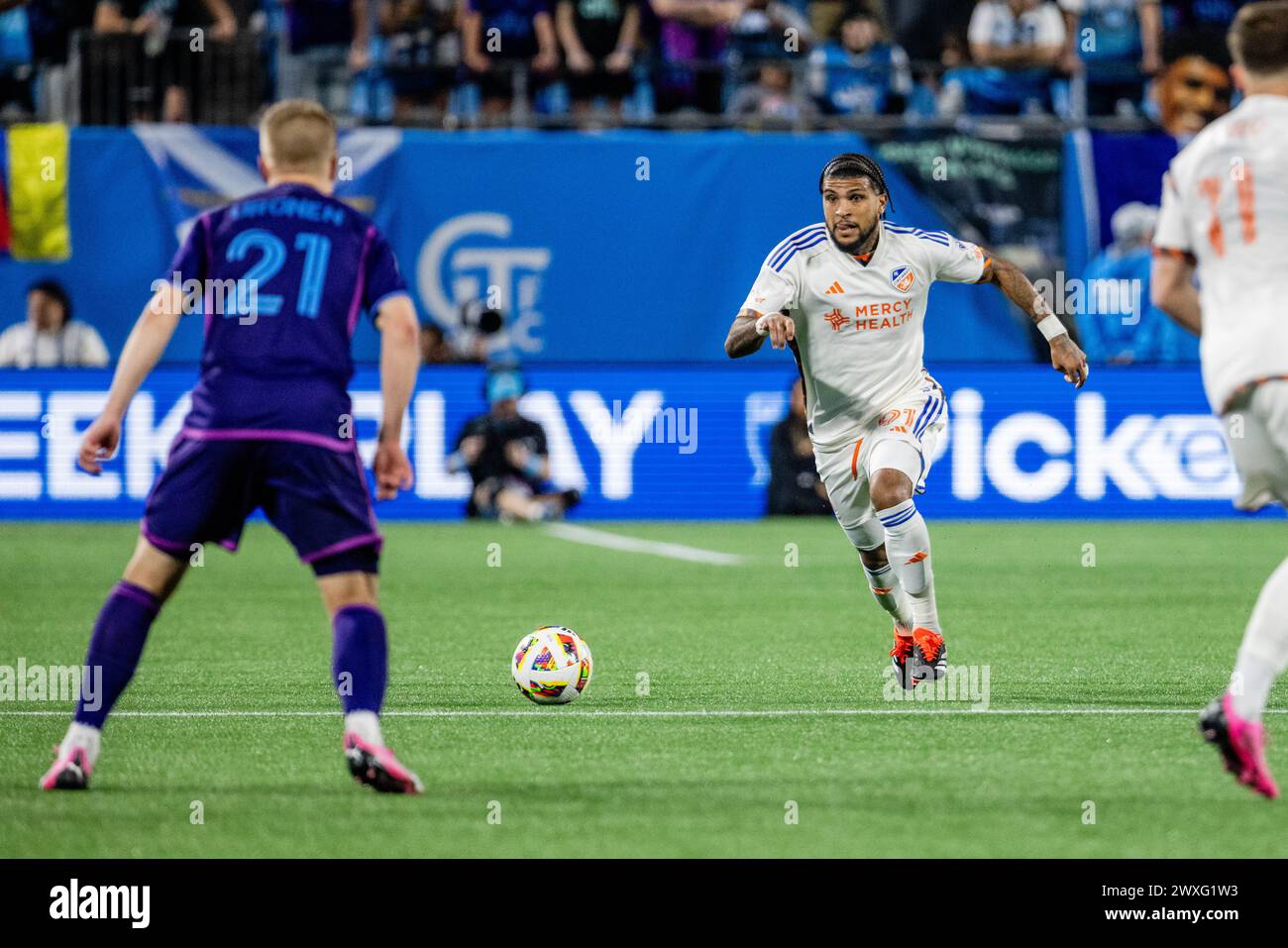 Charlotte, NC, USA. 30th Mar, 2024. FC Cincinnati defender DeAndre Yedlin (91) push up field against the Charlotte FC during the second half of the Major League Soccer match up at Bank of America Stadium in Charlotte, NC. (Scott KinserCal Sport Media) (Credit Image: © Scott Kinser/Cal Sport Media). Credit: csm/Alamy Live News Stock Photo