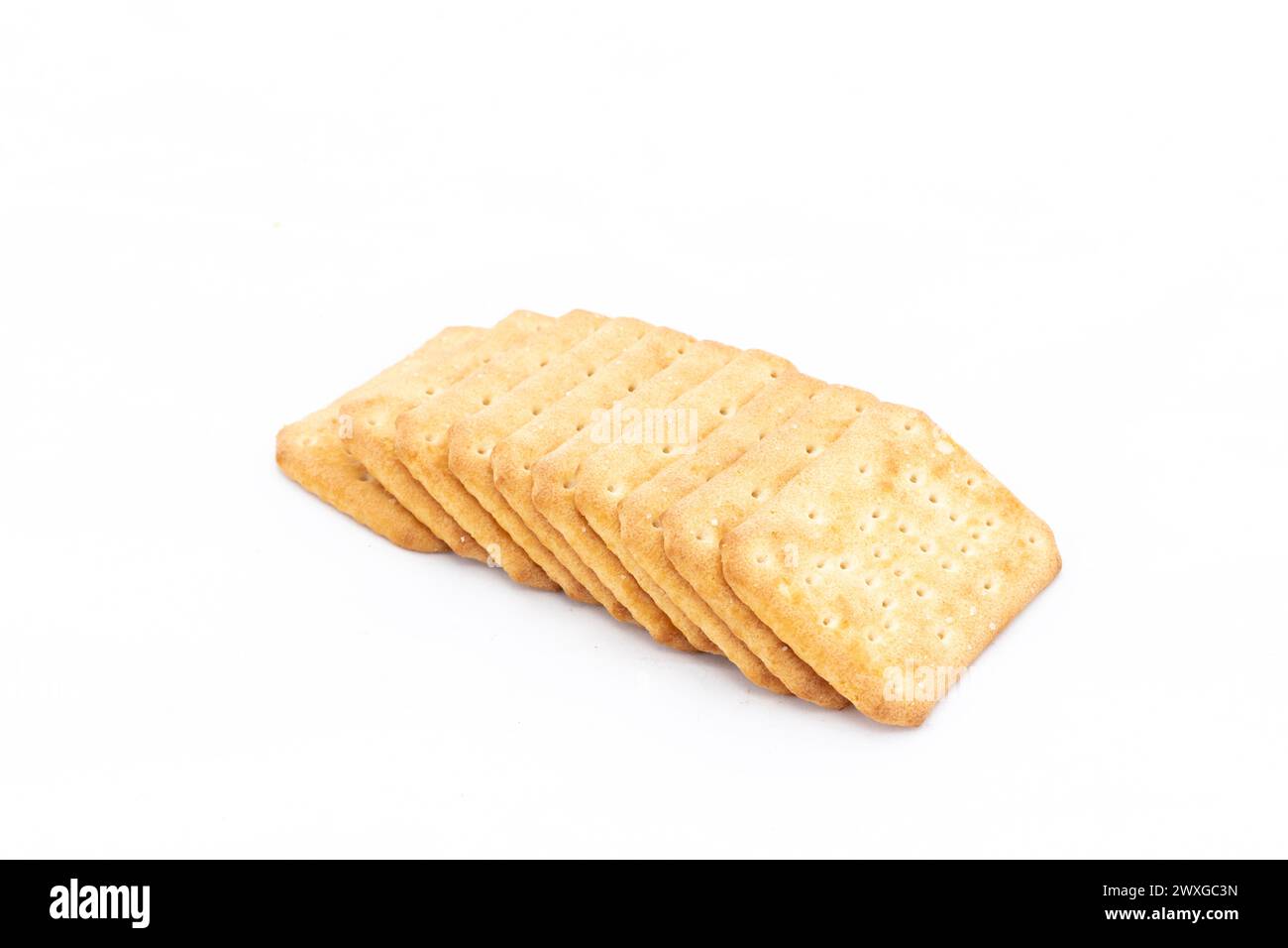 Row of salty crackers isolated on a white background. Copy space Stock Photo