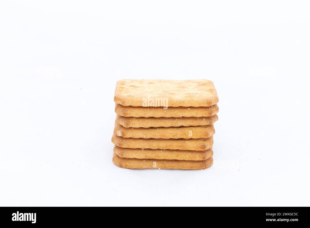 Stack of crackers biscuits isolated on a white background with copy space. Stock Photo