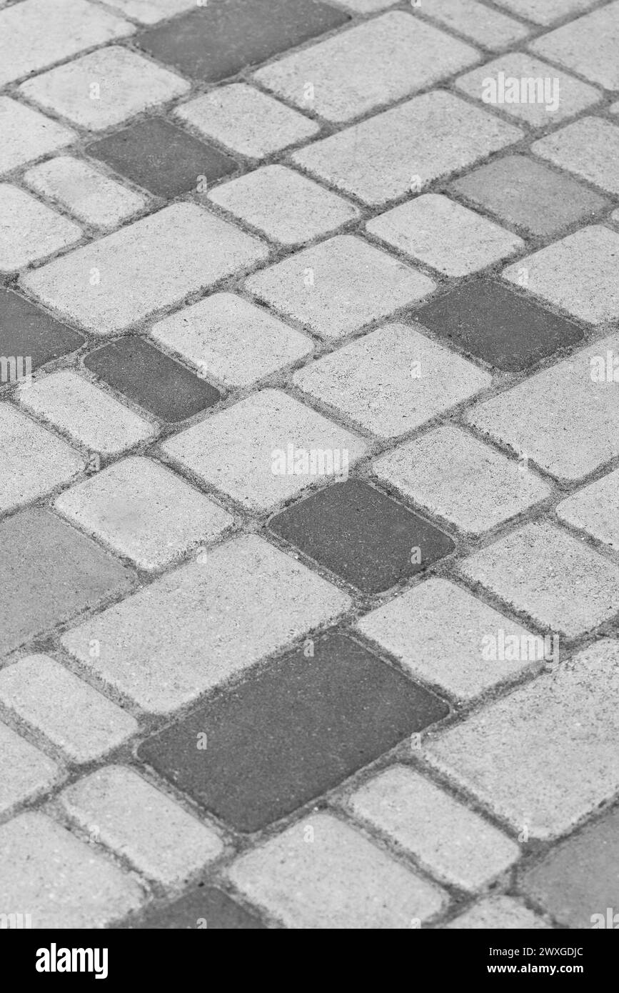 Grey Stone Pattern Paving Tile Mosaic Floor Street Texture Background Gray Structure Road. Stock Photo