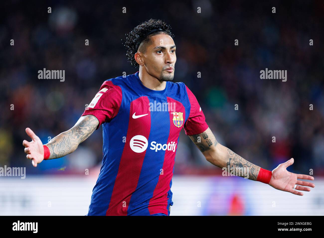 Barcelona, Spain. 30th Mar, 2024. Raphinha celebrates after scoring a goal during the LaLiga EA Sports match between FC Barcelona and UD Las Palmas at the Estadi Olimpic Lluis Companys in Barcelona, Spain. Credit: Christian Bertrand/Alamy Live News Stock Photo