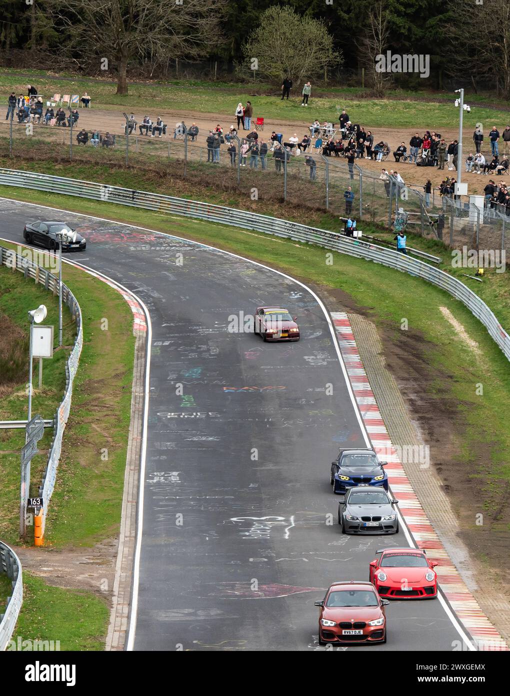 SYMBOL 30 March 2024, RhinelandPalatinate, Nürburg Numerous car fans line the Nordschleife