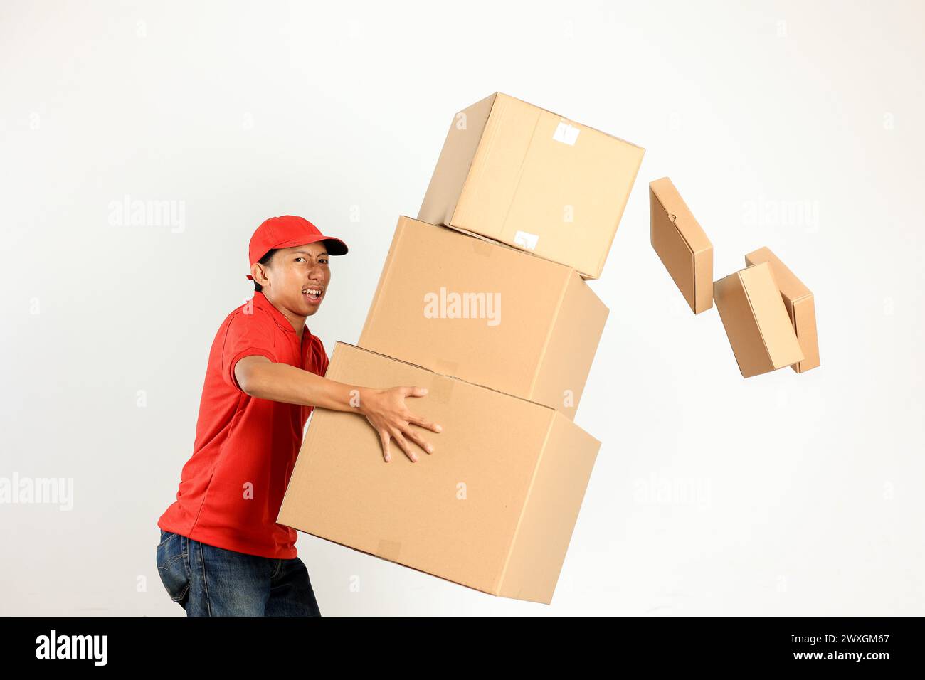 Worker lifting cardboard box hi-res stock photography and images - Alamy