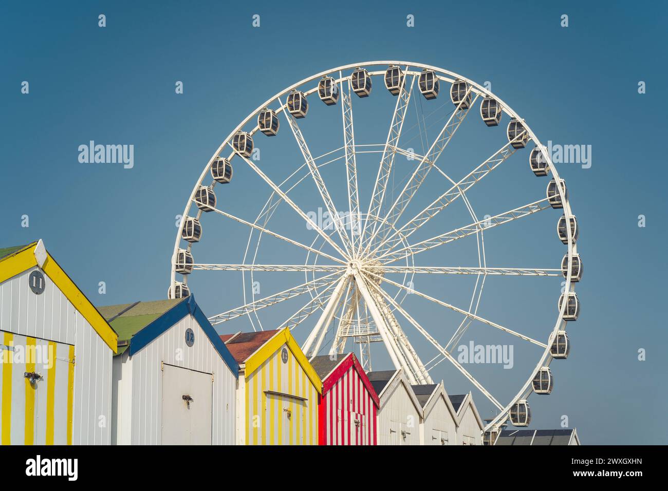 Great Yarmouth big wheel and beach huts Stock Photo Alamy