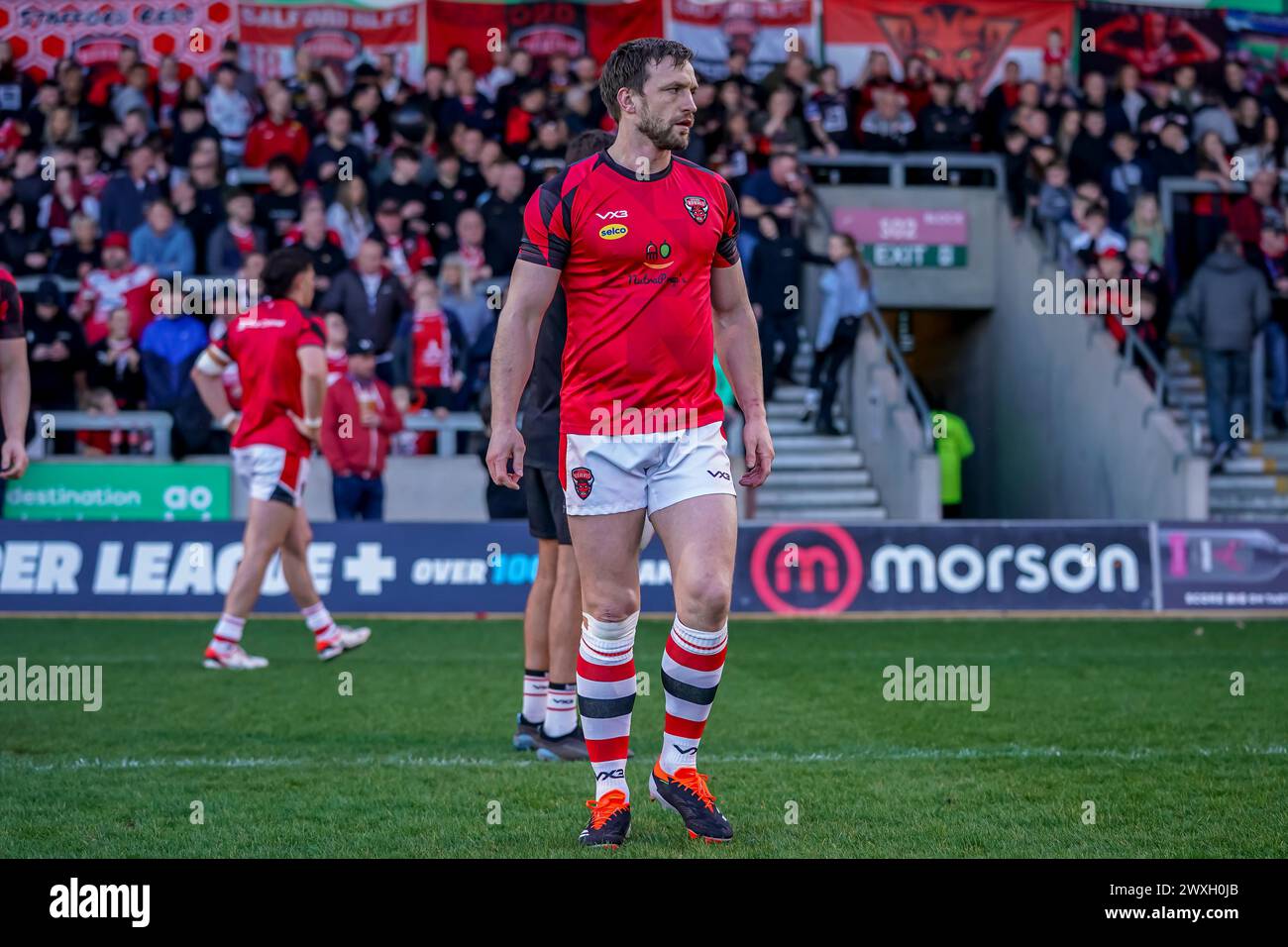 Salford, Manchester, UK. 30th March, 2024. Super League Rugby: Salford Red Devils Vs Leigh Leopards at Salford Community Stadium. JOE MELLOR pre game warm up. Credit James Giblin/Alamy Live News. Stock Photo