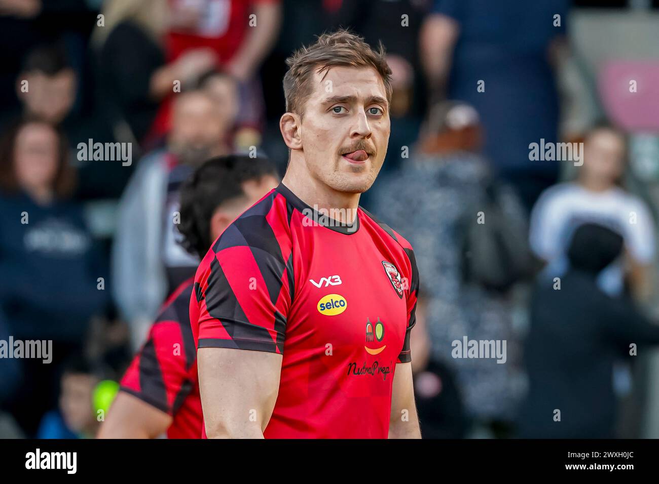 Salford, Manchester, UK. 30th March, 2024. Super League Rugby: Salford Red Devils Vs Leigh Leopards at Salford Community Stadium. ANDREW DIXON pre game warm up. Credit James Giblin/Alamy Live News. Stock Photo