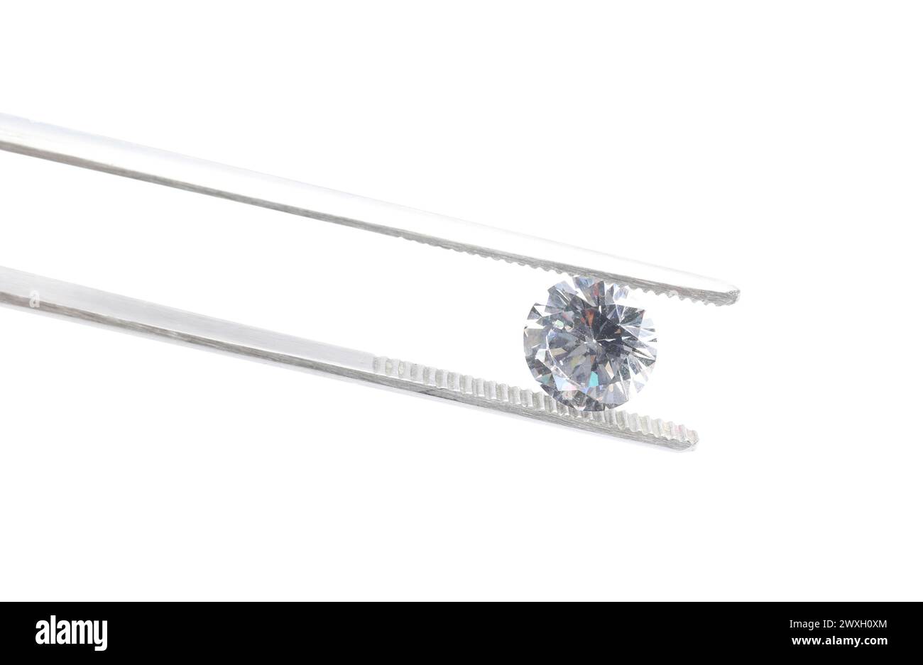 Tweezers with beautiful shiny diamond isolated on white Stock Photo - Alamy