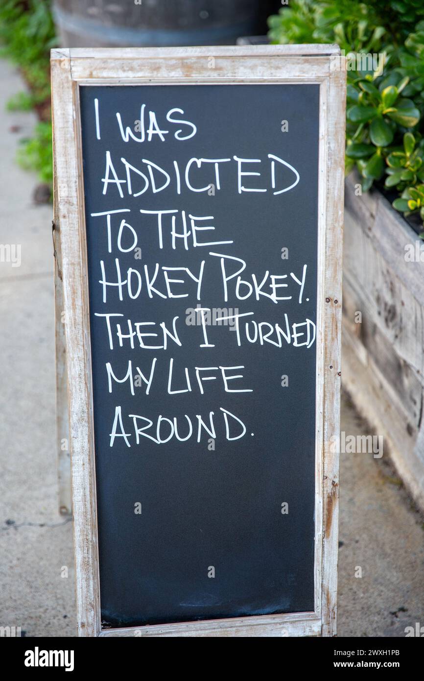 Silly bar sign thats changed daily Stock Photo - Alamy