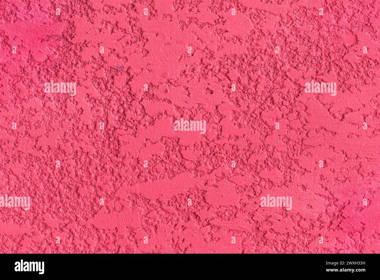 Pink paint texture plaster wall rough stucco background solid abstract pattern. Stock Photo