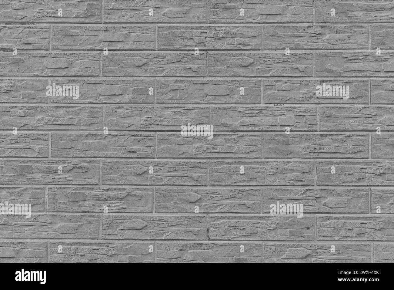 Grey abstract brick wall pattern texture facade house background ...