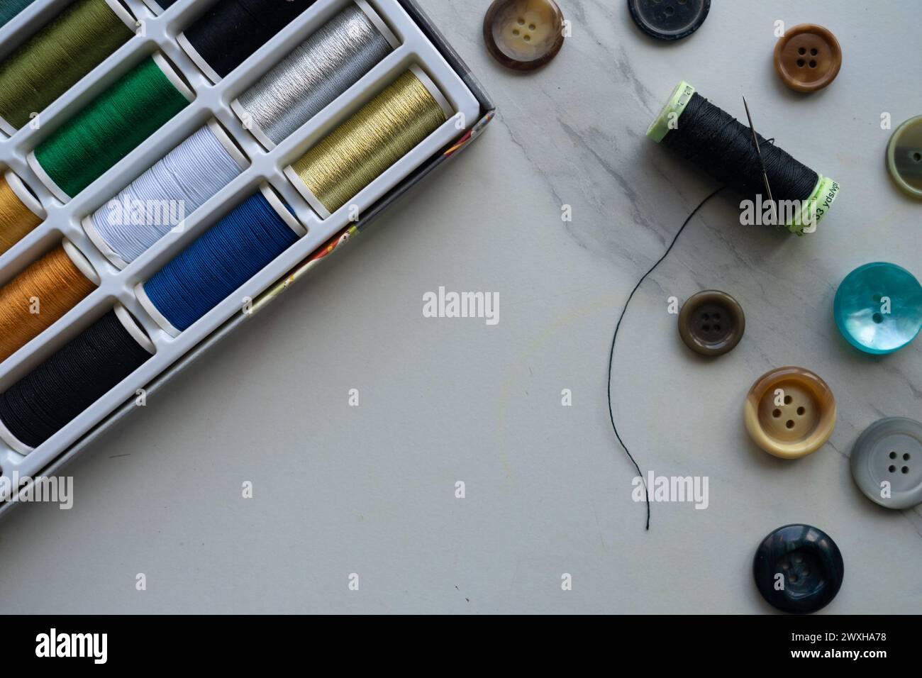 Sewing set on a white table Stock Photo