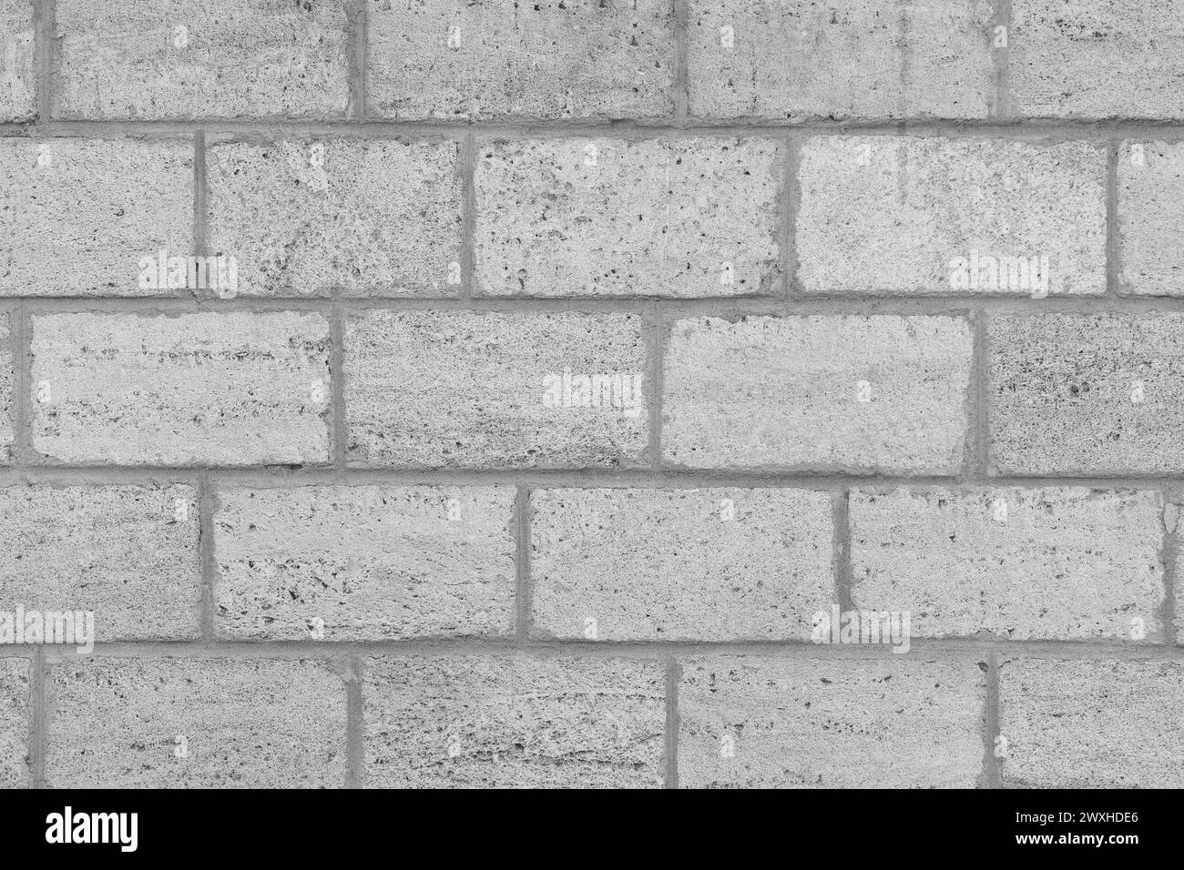 Grey Brick Blocks Shell Wall Masonry Sand Natural House Structure Background Limestone. Stock Photo