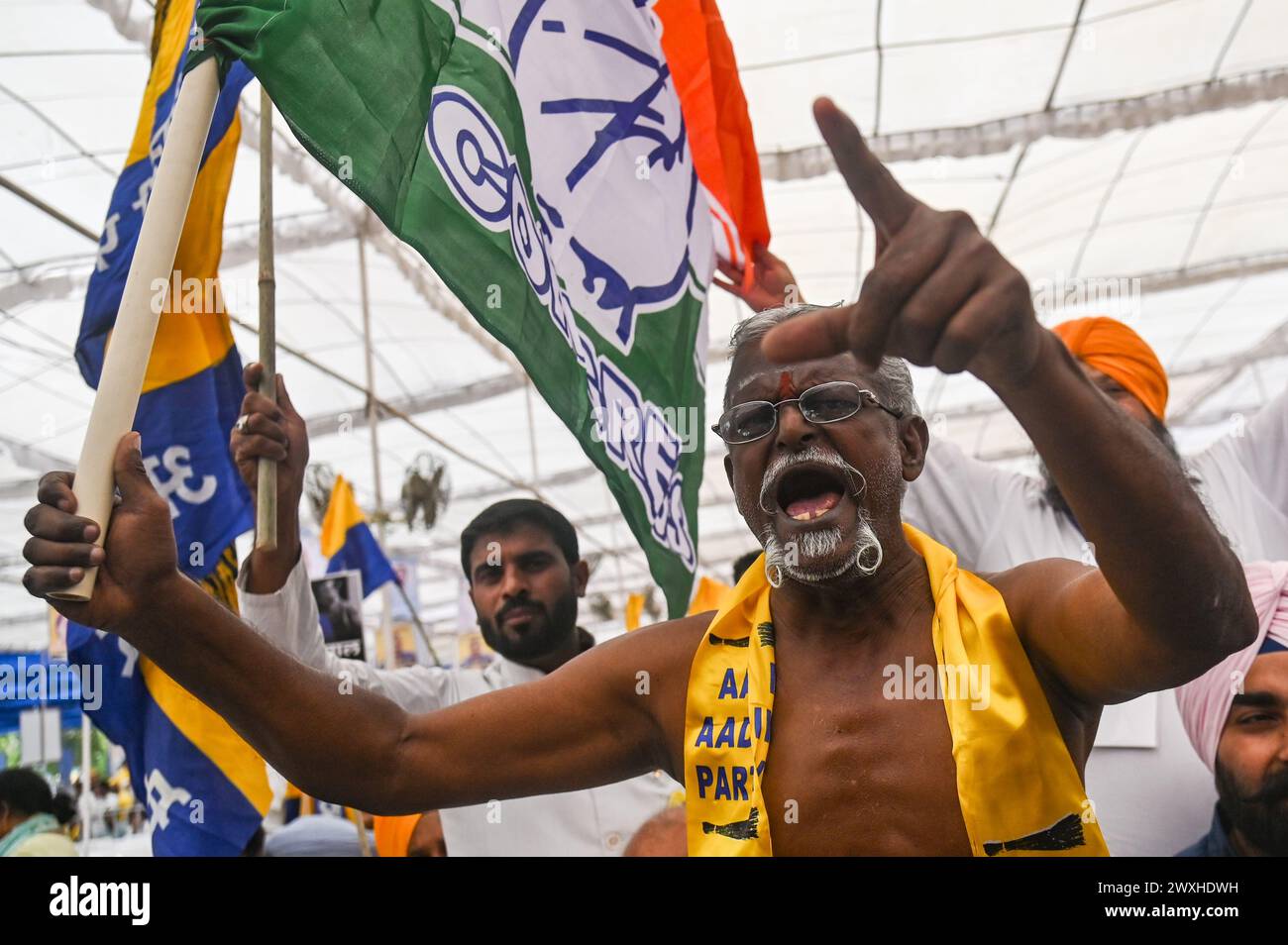 New Delhi, Delhi, India. 31st Mar, 2024. A supporter of the Aam Aadmi Party shouts slogans during a mega rally organised by various opposition parties of India, in New Delhi, India on March 31, 2024. (Credit Image: © Kabir Jhangiani/ZUMA Press Wire) EDITORIAL USAGE ONLY! Not for Commercial USAGE! Credit: ZUMA Press, Inc./Alamy Live News Stock Photo
