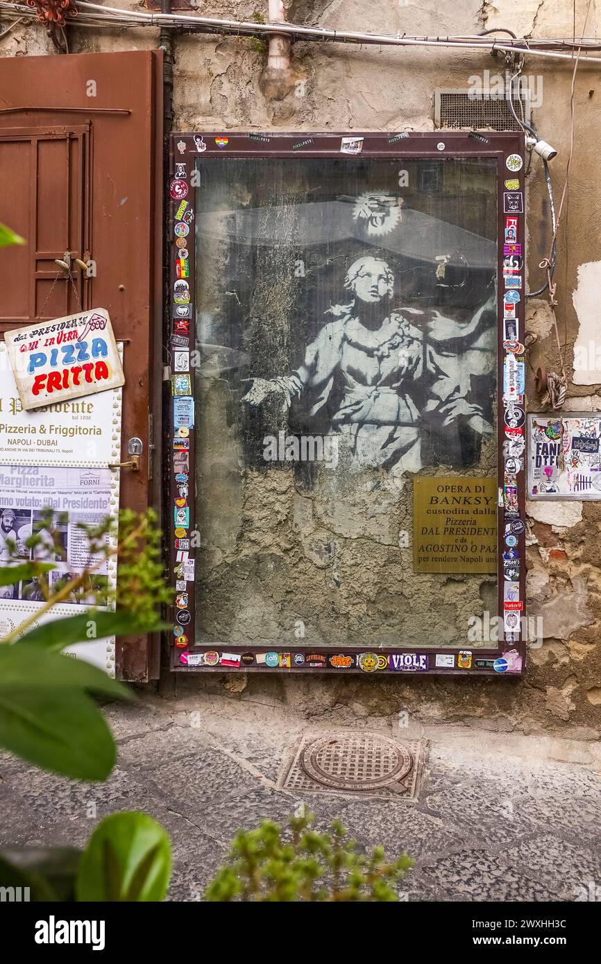Banksy Naples, Madonna with a Pistol, artwork in old centre