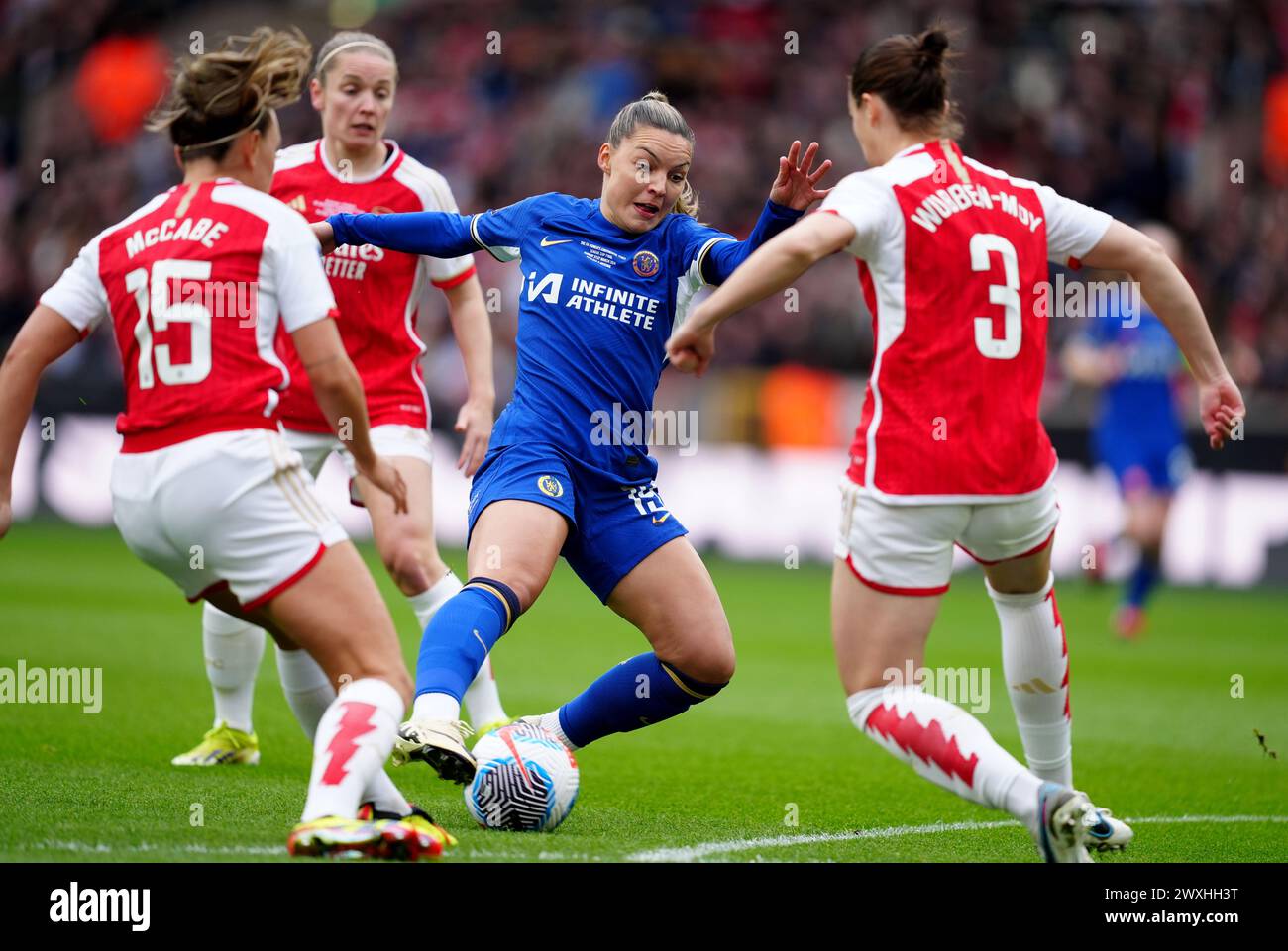 Chelsea's Johanna Rytting Kaneryd takes on Arsenal's Katie McCabe (left) and Lotte Wubben-Moy (right) during the FA Women's Continental Tyres League Cup Final at Molineux Stadium, Wolverhampton. Picture date: Sunday March 31, 2024. Stock Photo