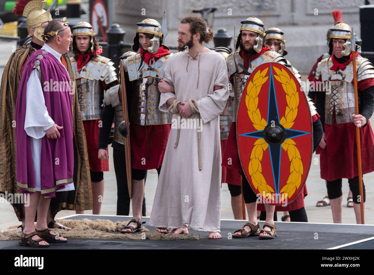 The Passion of Christ open air play by Wintershall in Trafalgar Square, London, on Easter Good Friday. Christ detained by Romans Stock Photo