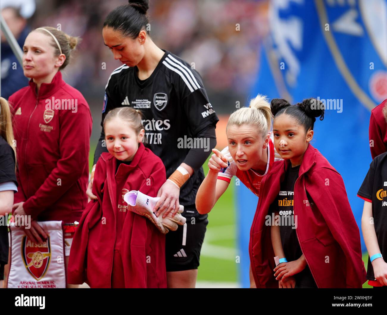 Arsenal's Leah Williamson with a mascot ahead of the FA Women's Continental Tyres League Cup Final at Molineux Stadium, Wolverhampton. Picture date: Sunday March 31, 2024. Stock Photo