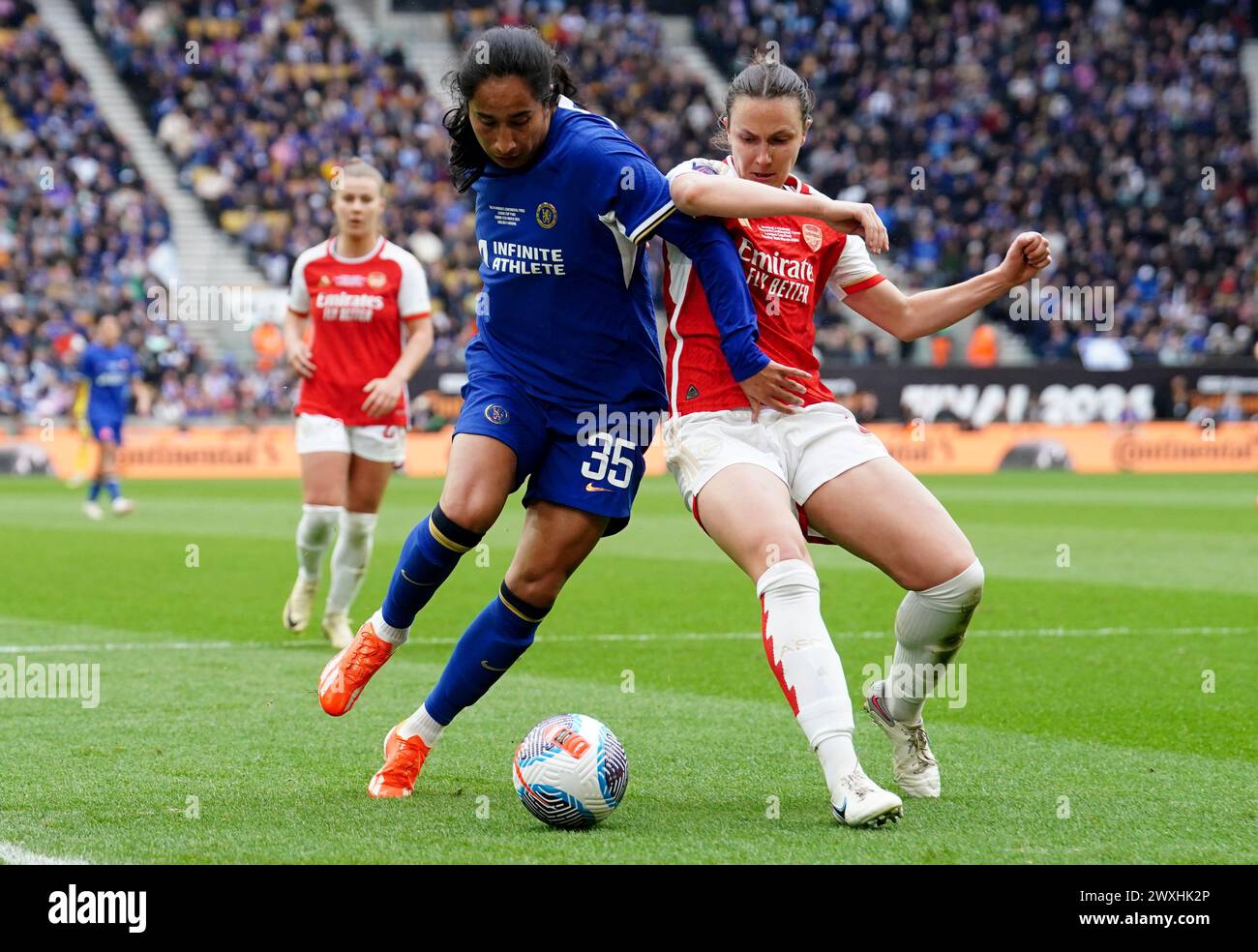 Chelsea's Mayra Ramirez battles for the ball against Arsenal's Lotte Wubben-Moy during the FA Women's Continental Tyres League Cup Final at Molineux Stadium, Wolverhampton. Picture date: Sunday March 31, 2024. Stock Photo